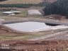 Double-lined landfill leachate ponds. Designed unique air-inflated cover over pond